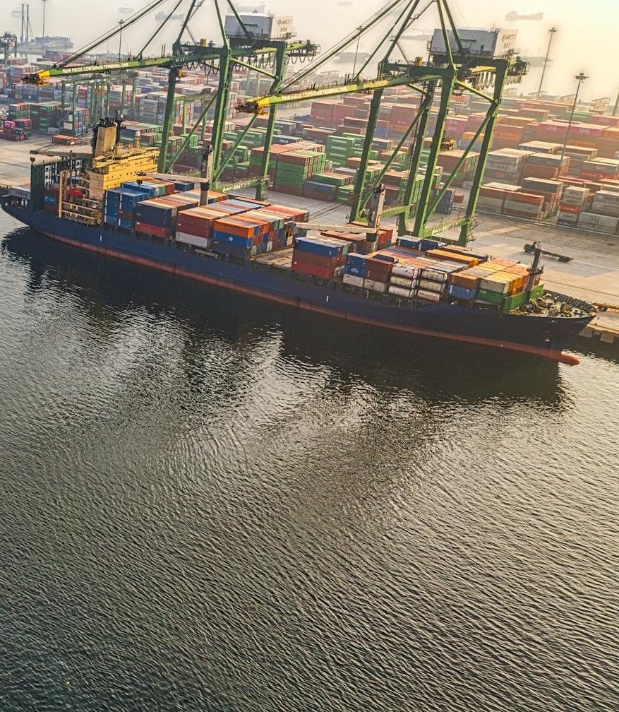 cargo-ship-docked-at-port-maritime-shipping-sea-freight-global-trade-logistics